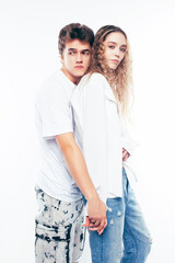 Fototapeta premium young pretty couple together posing cheerful isolated on white background, lifestyle people concept, happy boy and girl