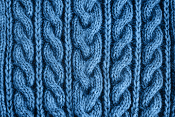 Blue knitted texture. Handmade Knitwear. Background. Color of the year, 2020