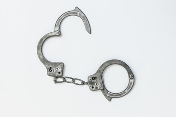 Handcuffs on white background isolate