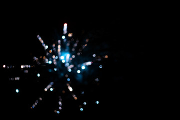 Color fireworks festival. Christmas, new year celebration holiday out of focus background. Dark...