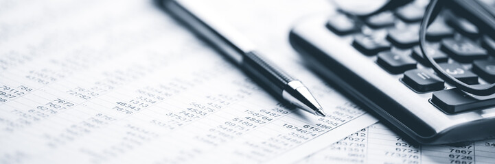  Close-up Pen Calculator And Reading Glasses On Financial Report - Business Accounting Concept