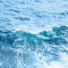 Fototapeta na wymiar Classic blue sea wave close up. Color of the year 2020 background