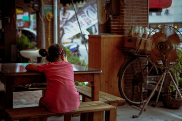 A girl waiting for something, Tainan, Taiwan.