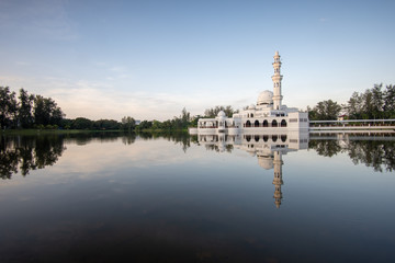 Morning scenery over the white floating mosque.