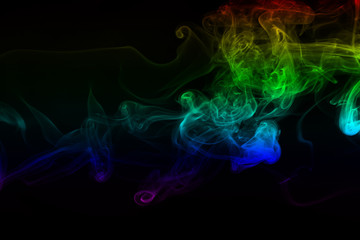 Beautiful colorful smoke abstract on black background, Movement of fire design