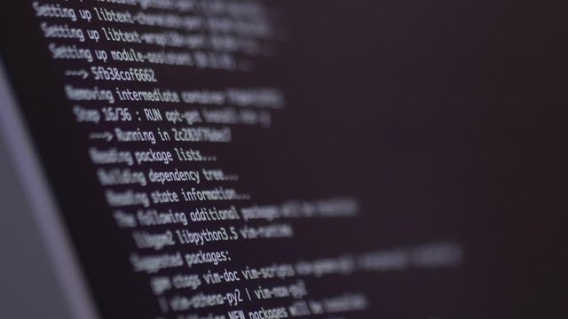 programming code development scrolling on computer screen 4k