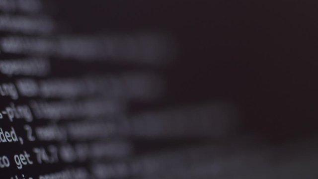 programming code development scrolling on computer screen 4k