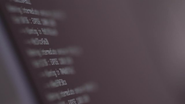 programming code development scrolling on computer screen 4k