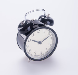 clock or alarm clock on a background new.