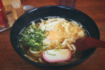 Udon with boiled egg, spring onion, fish ball in hot soup