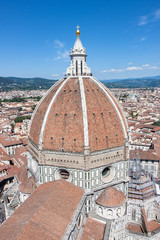 Fototapeta na wymiar Vertical Crop of Dome of the Duomo di Firenze and Surrounding City of Florence