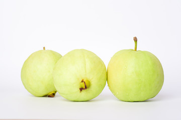 Fresh organic guava tropical fruit on white background. Healthy food high vitamin C concept.