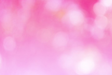 Beautiful pink bokeh out of focus background from tree in nature, abstract art