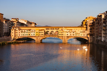 Fototapeta na wymiar Ponte Vecchio at Sunset in Florence Italy