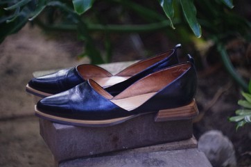Black pumps. Genuine leather black woman‘s shoes. Winklepicker. Almond-toe shoes. Pointed Ballet...