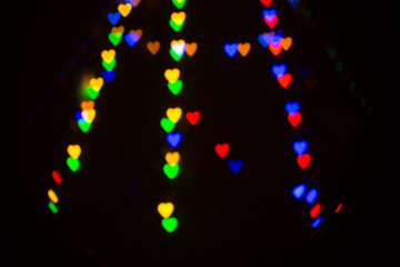 Colorful abstract heart shape blured bokeh at night