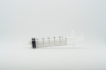 medical syringe 6 ml empty, isolated on a white background.