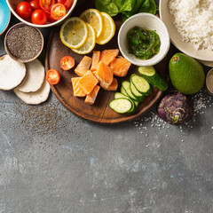 Ingredients for preparation poke bowl with salmon, avocado, vegetables and chia seeds top view