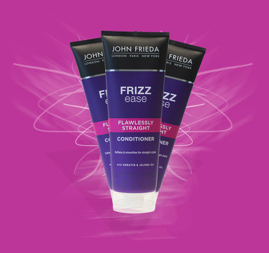 Frizz Ease By John Frieda On An Abstract Background