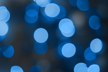 Blue 2020 color abstract background with bokeh defocused lights