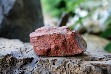 Shale is a sedimentary rock composed of very fine clay particles. There is noise and grain caused...