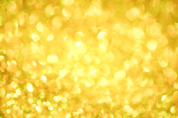 Luxury gold glitter with bokeh background, de-focused. concept for chrismas, holiday, happy new year, festive decoration.