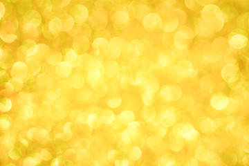 Luxury gold glitter with bokeh background, de-focused. concept for chrismas, holiday, happy new year, festive decoration.