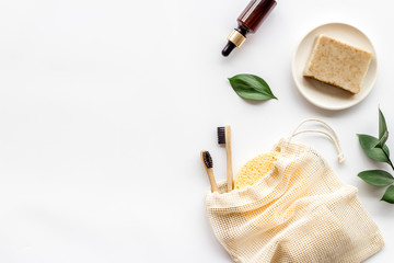 Self-care with herbal formulations - essential oils and soap - on white background top view copy space