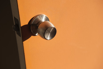 orange door and knob