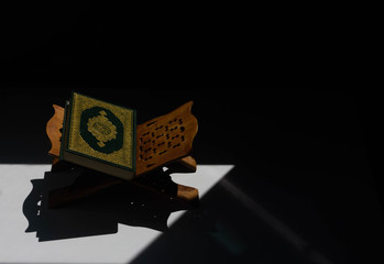 Quran in the mosque  put on a wooden board