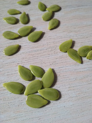 green beans. carob green seeds on wooden background.