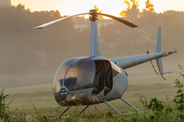 Helicopter Aircraft Silver Open Four Seater Dawn Grass Field