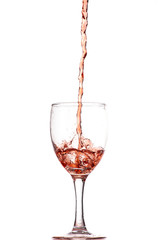 pouring red wine into a glass, strong flow and splash