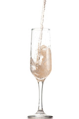 pouring white wine, champagne into a tall glass, strong flow and splash