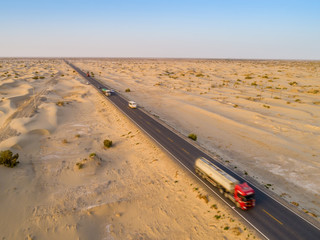 aerial view of highway on the gobi desert xinjiang