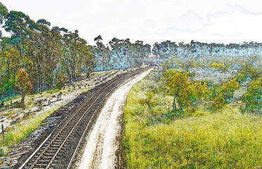Landscape with railway tracks running through a rural area