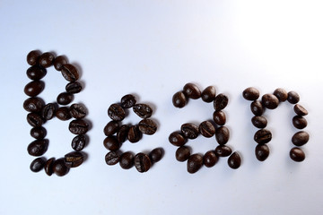 Coffee Beans, the letter of bean is formed with coffee beans in white background
