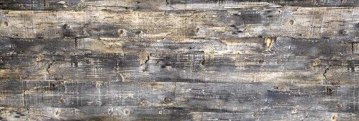 Shabby wood texture with old peeling paint. Vintage graffiti background, cracked wood texture.  Clipart, beautiful cracks on the surface of the table or wall, boards.