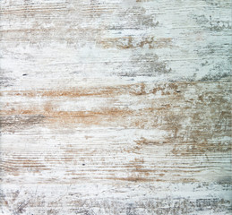 Fototapeta na wymiar Shabby wood texture with old peeling paint. Vintage graffiti background, cracked wood texture. Clipart, beautiful cracks on the surface of the table or wall, boards.