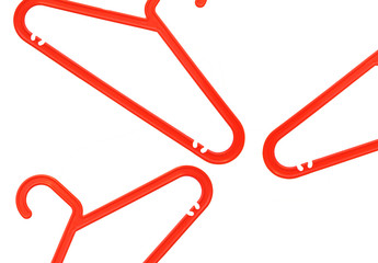 Obraz premium red plastic clothes hanger