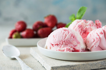 Homemade strawberry vanilla ice cream with fresh strawberries. Sweet berry summer dessert. Concrete  background copy space - Powered by Adobe