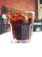 Cola drink with ice cubes