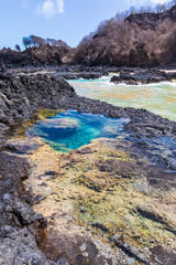 View of one of the stunning natural pools in Baia dos Porcos in Fernando de Noronha, Brazil