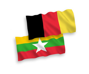 National vector fabric wave flags of Myanmar and Belgium isolated on white background. 1 to 2 proportion.