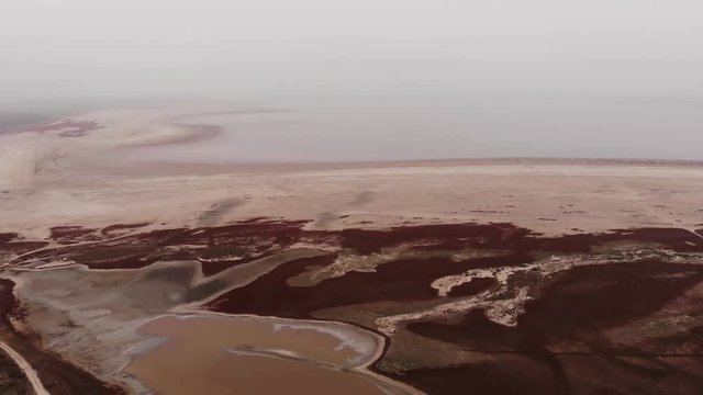 Shoal of estuary. Environmental problems on the estuary of the Sea of Azov. Aerial photography of a drying estuary.