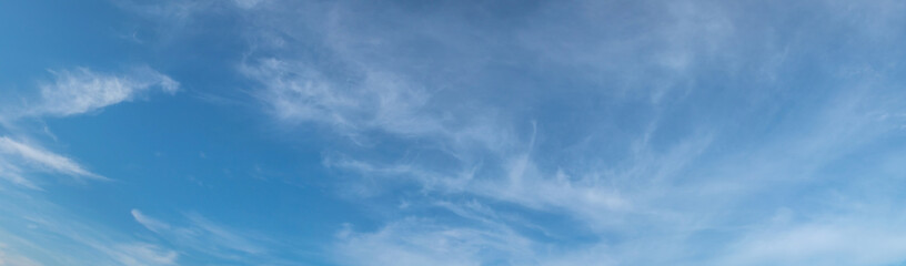 Panorama image of Beautiful white clouds with blue sky in summer seasonal.