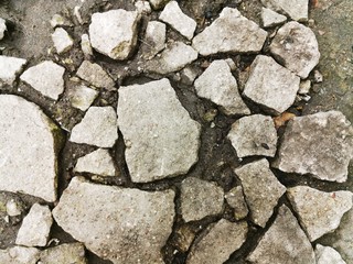 Old asphalt for wallpaper design. Vintage texture. Urban scene. Abstract gray background. 