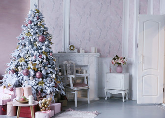 merry christmas card with christmas tree toys decoration presents close up photo on in pink room