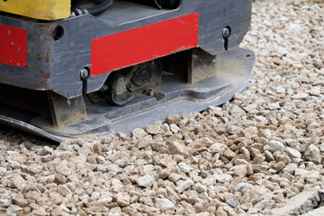 Vibrating machine on construction site