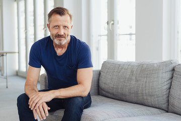 Fototapeta premium Attractive middle-aged man staring at camera